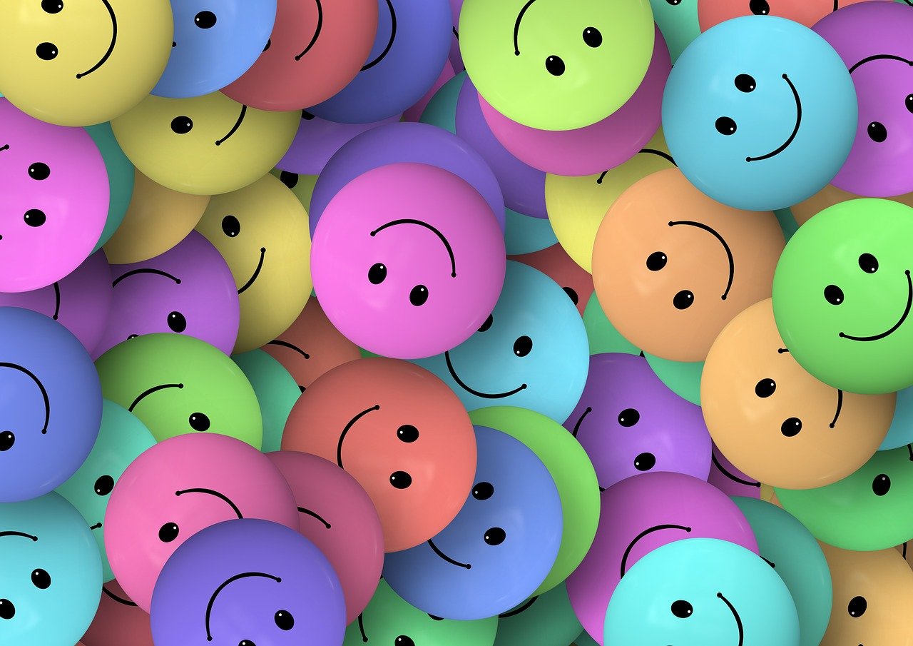 A colorful image of happy faces.